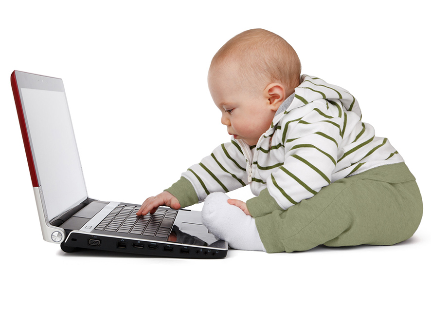 baby working on a labtop