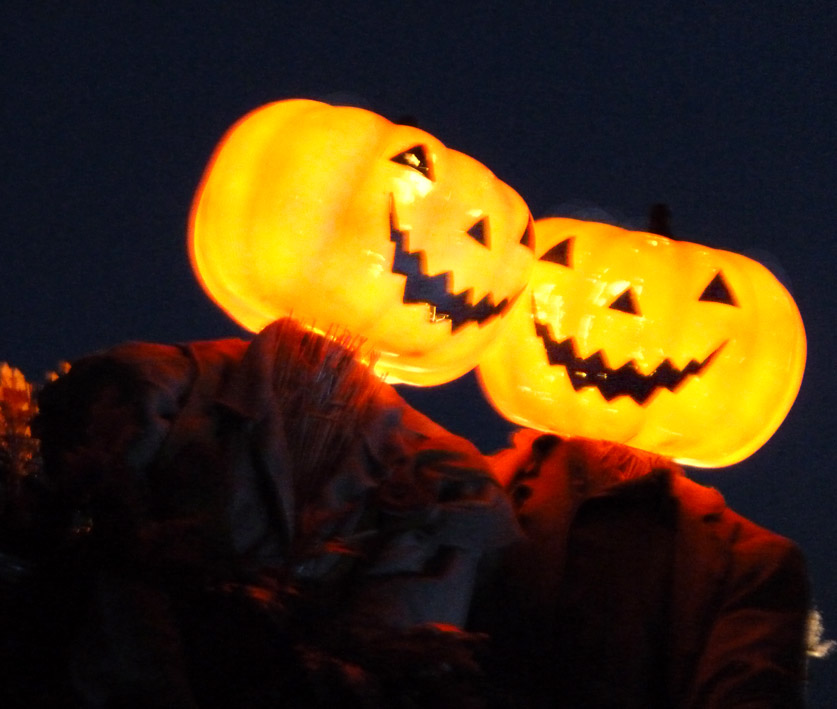lighted heads of scary pumpkin men