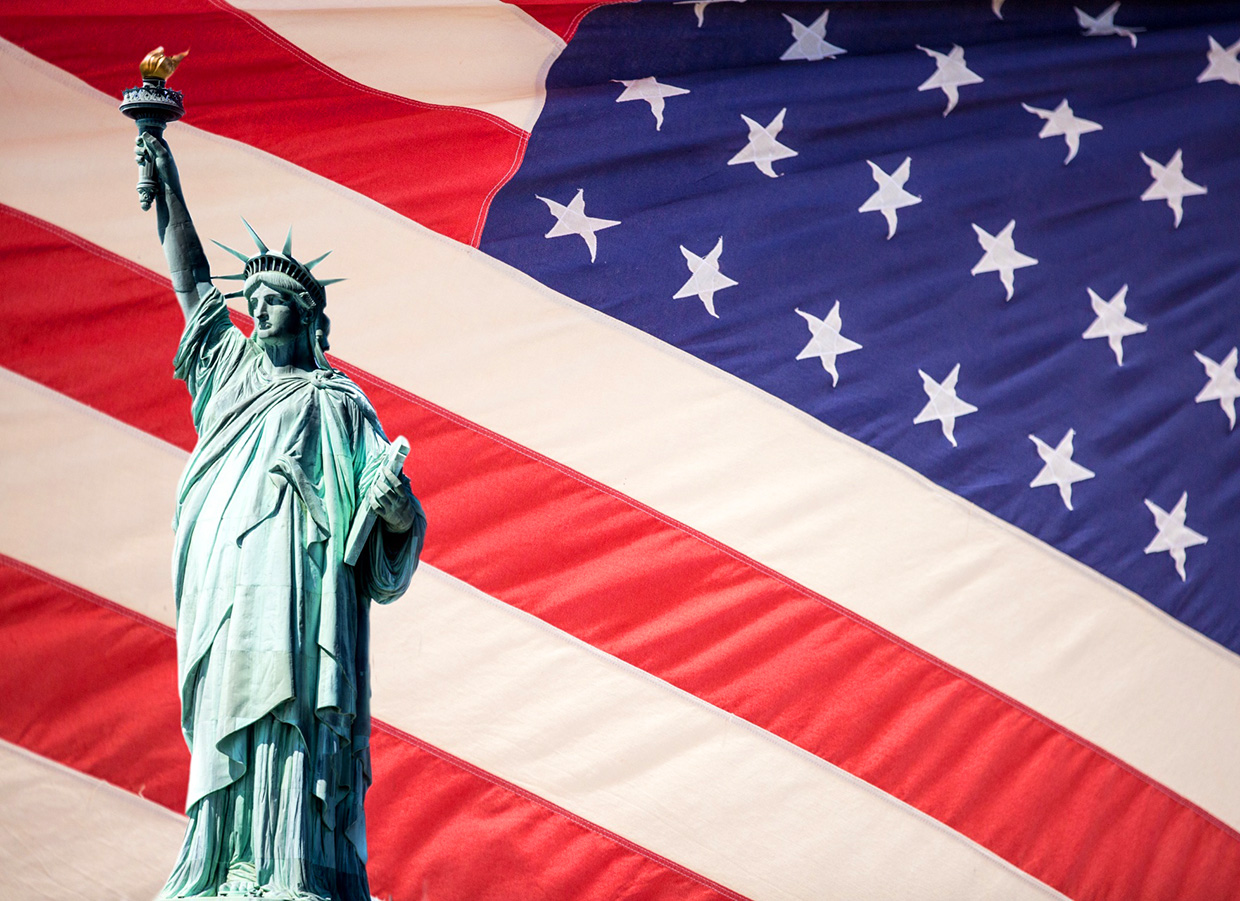 American flag and Statue of Liberty