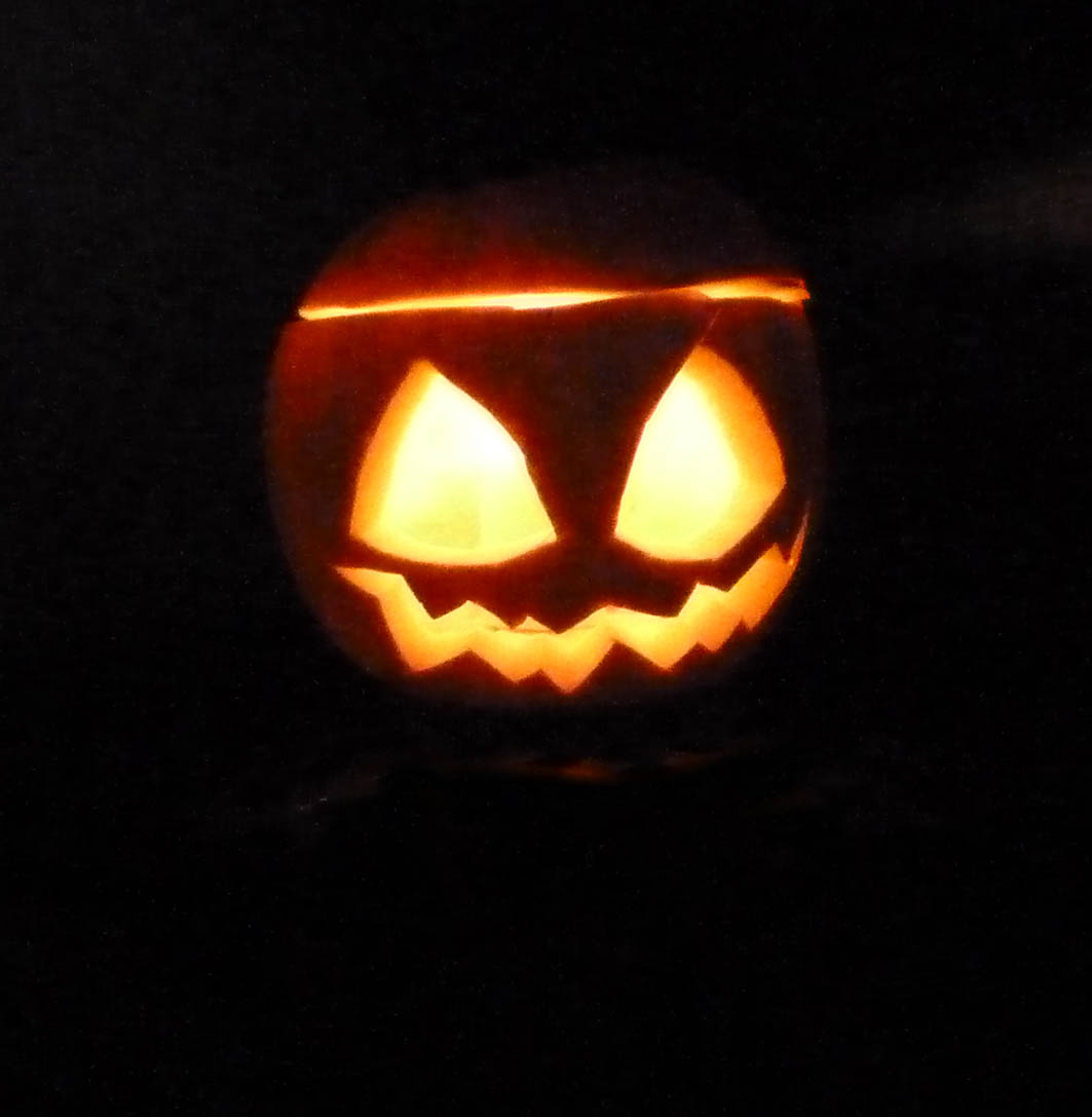 Halloween pumpkin head with light