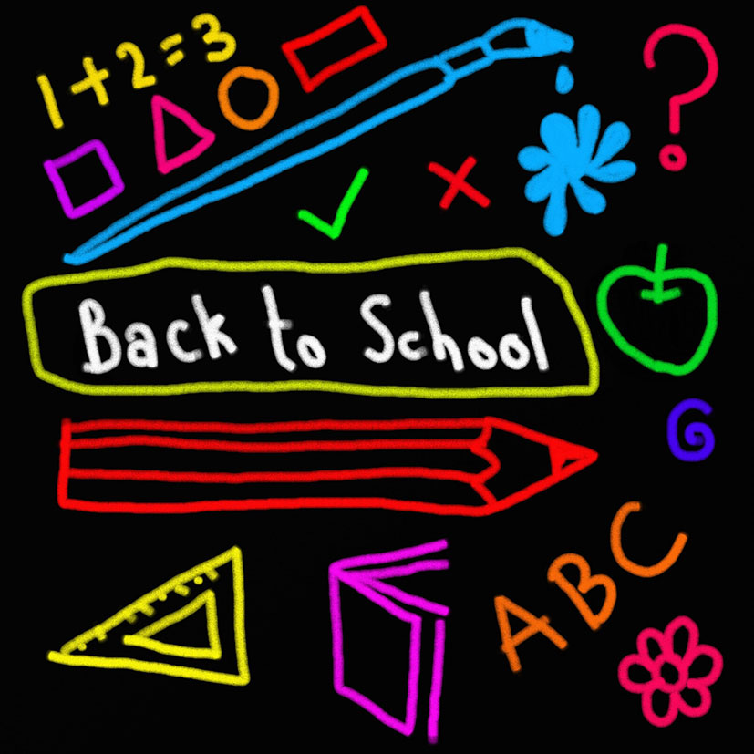 back to school written on blackboard