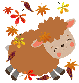 brown sheep with fall leaves