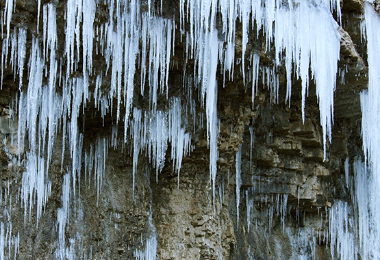 lots of icicles on rock