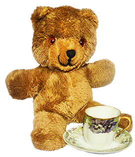 Teddy bear with tea cup